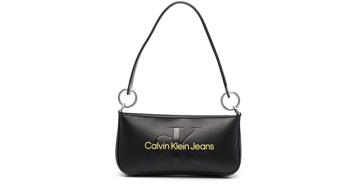 Calvin Klein Embossed-logo Shoulder Bag in Black | Lyst