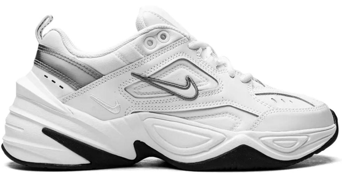 nike white tekno trainers