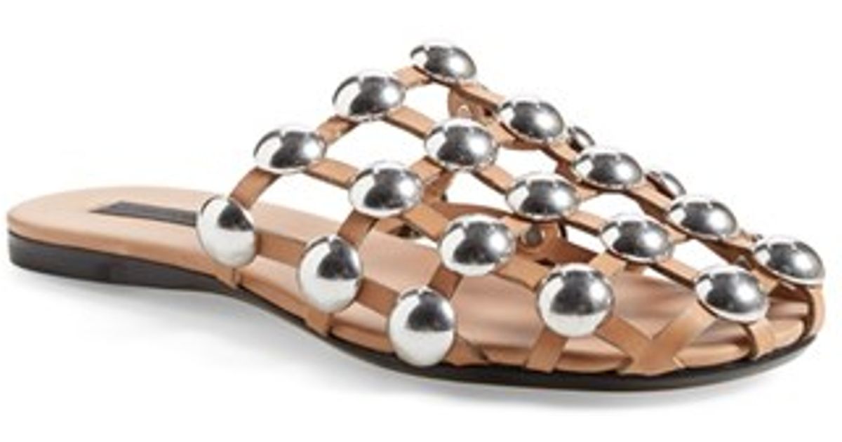 black slides with silver balls