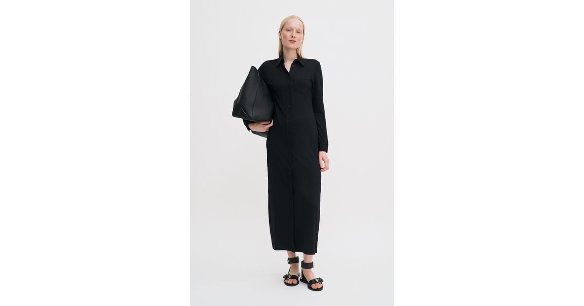 donna karan jersey wrap dress Donna Karan 1987 S/S Black Wool Jersey Plunge Neck Wrap Dress –  Featherstone Vintage main image 1