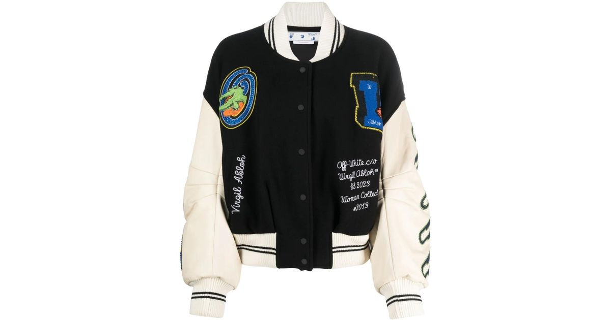 all white with black blazer