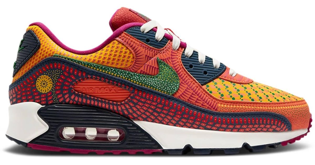 red and orange nike air max