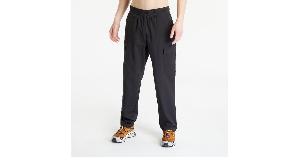 New Balance Athletics Woven Cargo Pant Black for Men Lyst