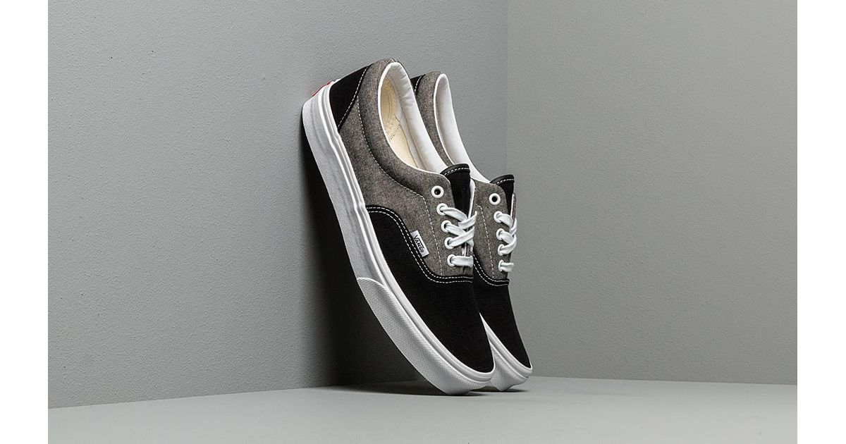 vans era trainers black