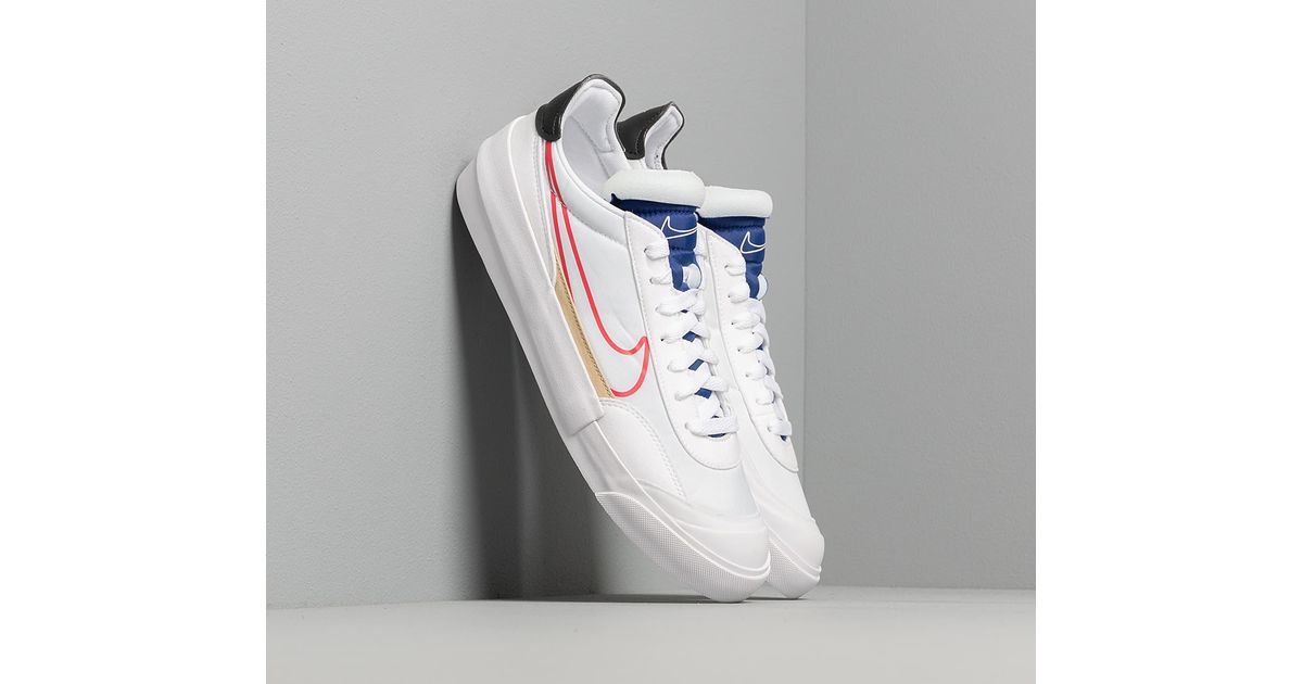 tenis da nike preto e dourado