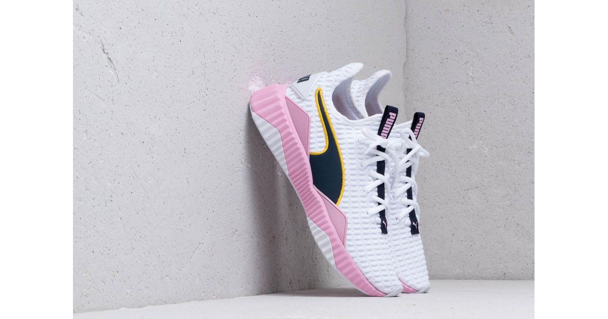 puma defy white pale pink