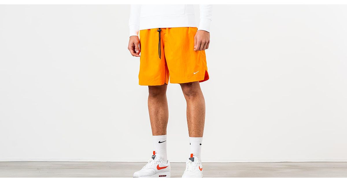 orange nike swim shorts
