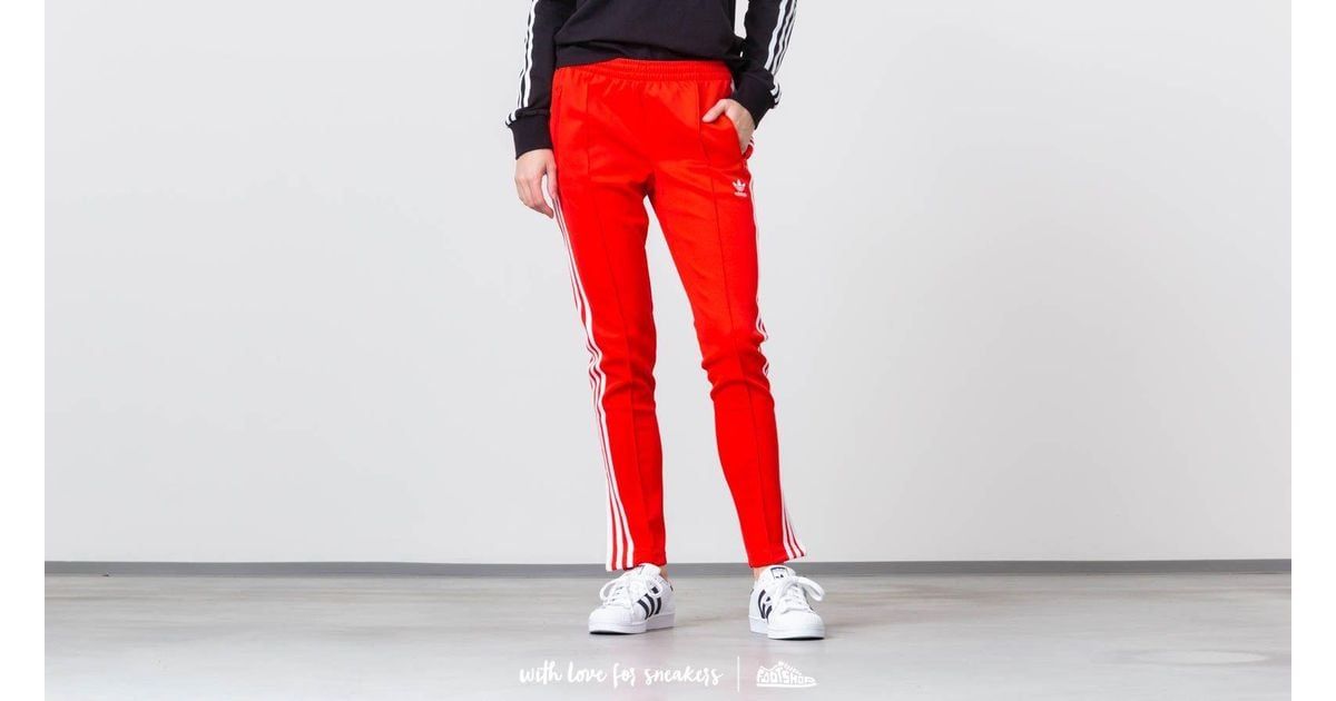 adidas sst track pants scarlet