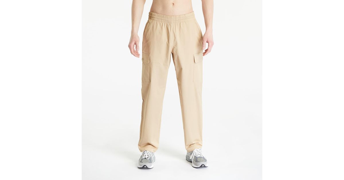 New Balance Athletics Woven Cargo Pant Incense in Natural for Men | Lyst