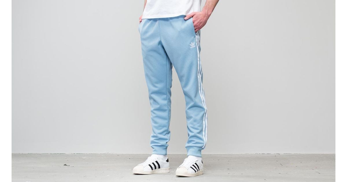 ash blue adidas track pants