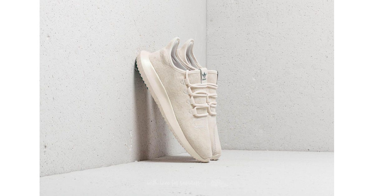 green and pink tubular adidas