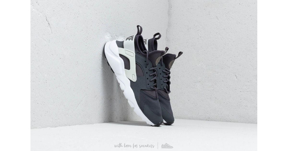 nike sportswear huarache run trainers blackpalm green nike sportswear huarache run trainers blackpalm green