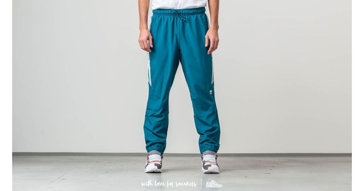 teal adidas track pants