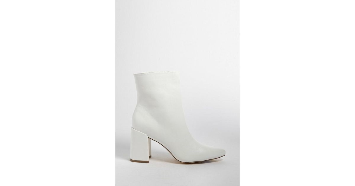 faux leather ankle boots white