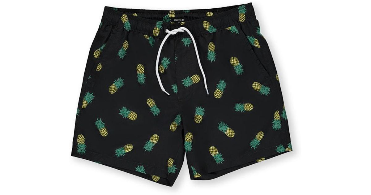 black pineapple swim trunks