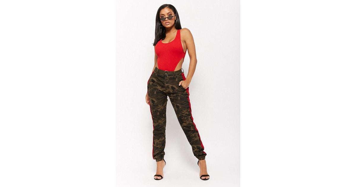 camouflage pants with red stripe