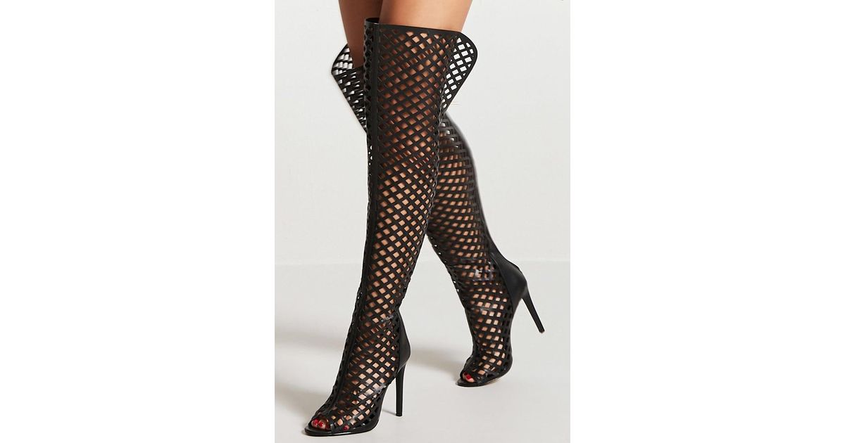 caged thigh high boots