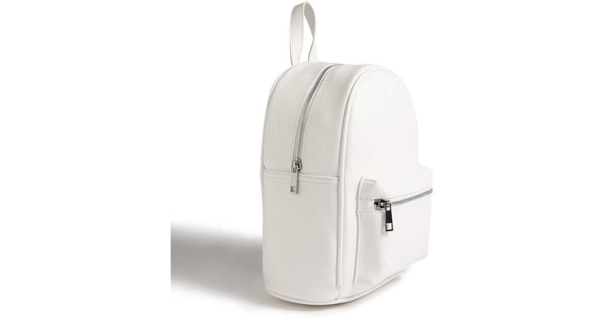 white faux leather backpack
