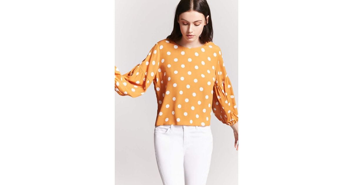 orange polka dot top