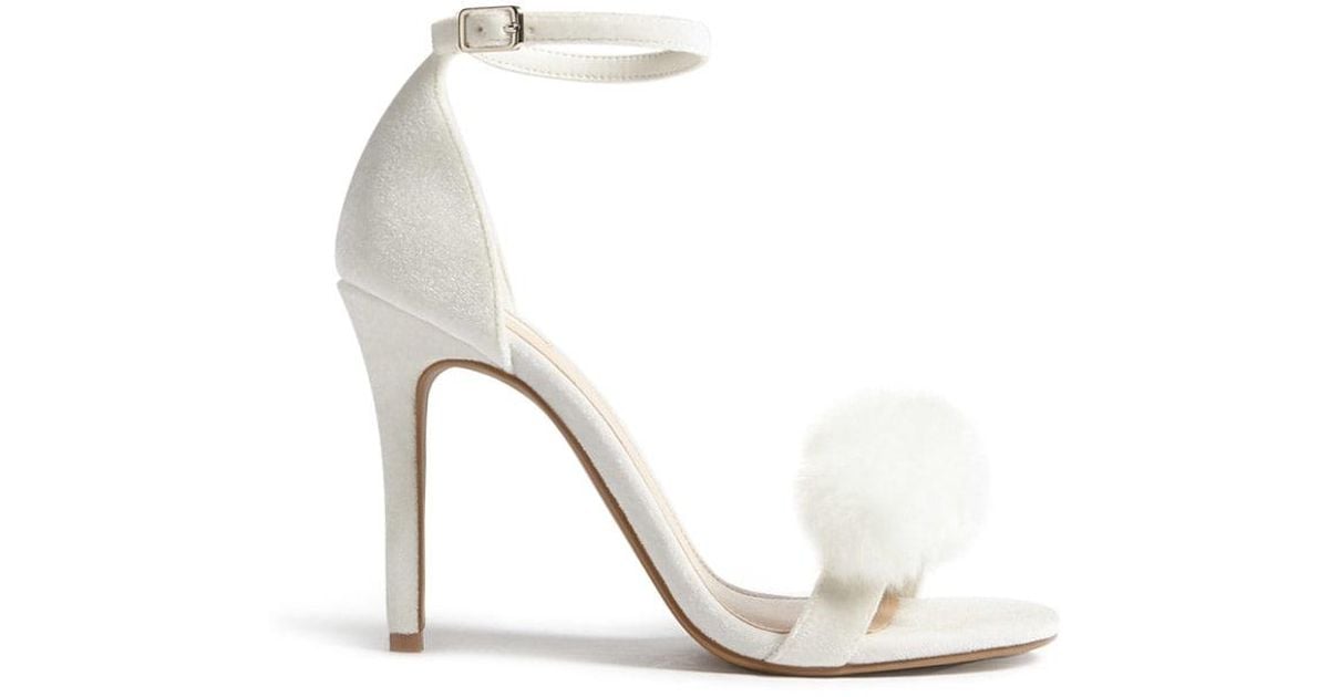 strappy fur heels