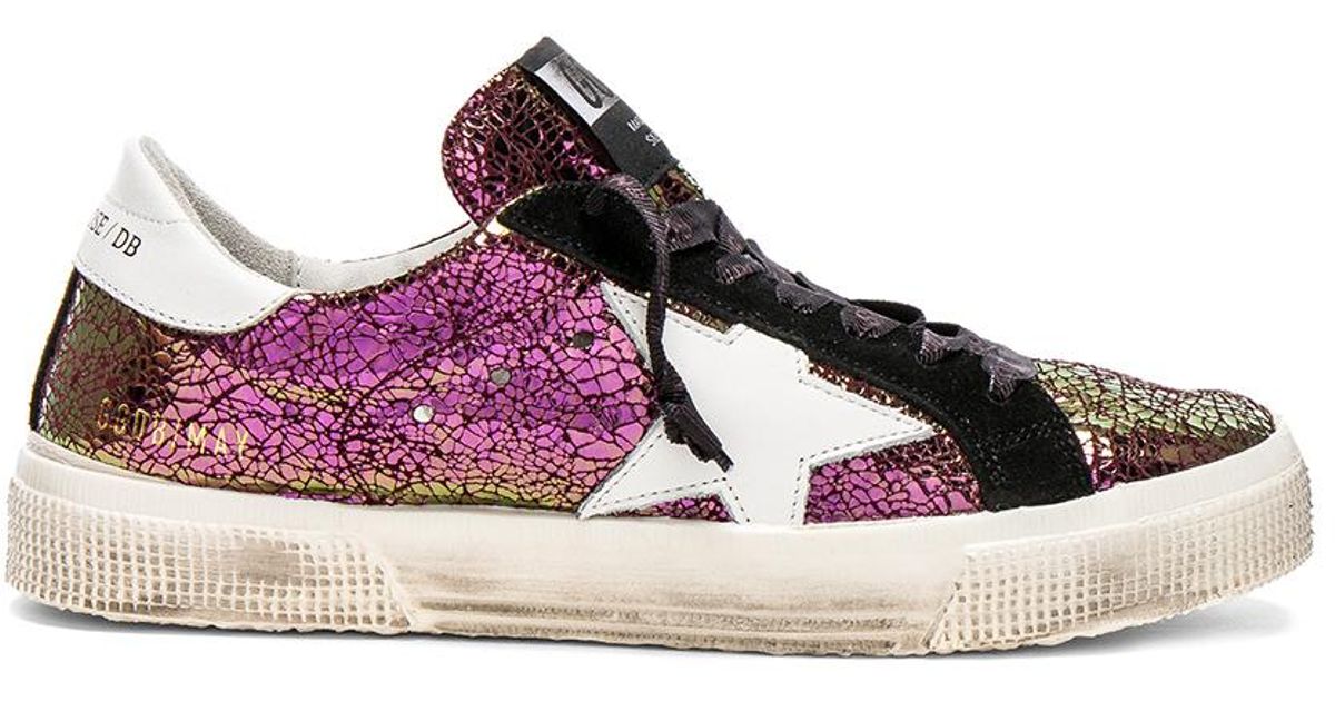 iridescent golden goose