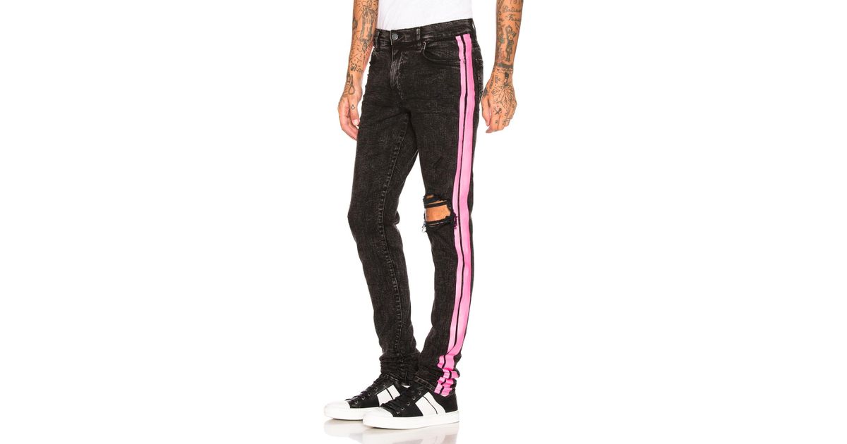 amiri broken track jeans