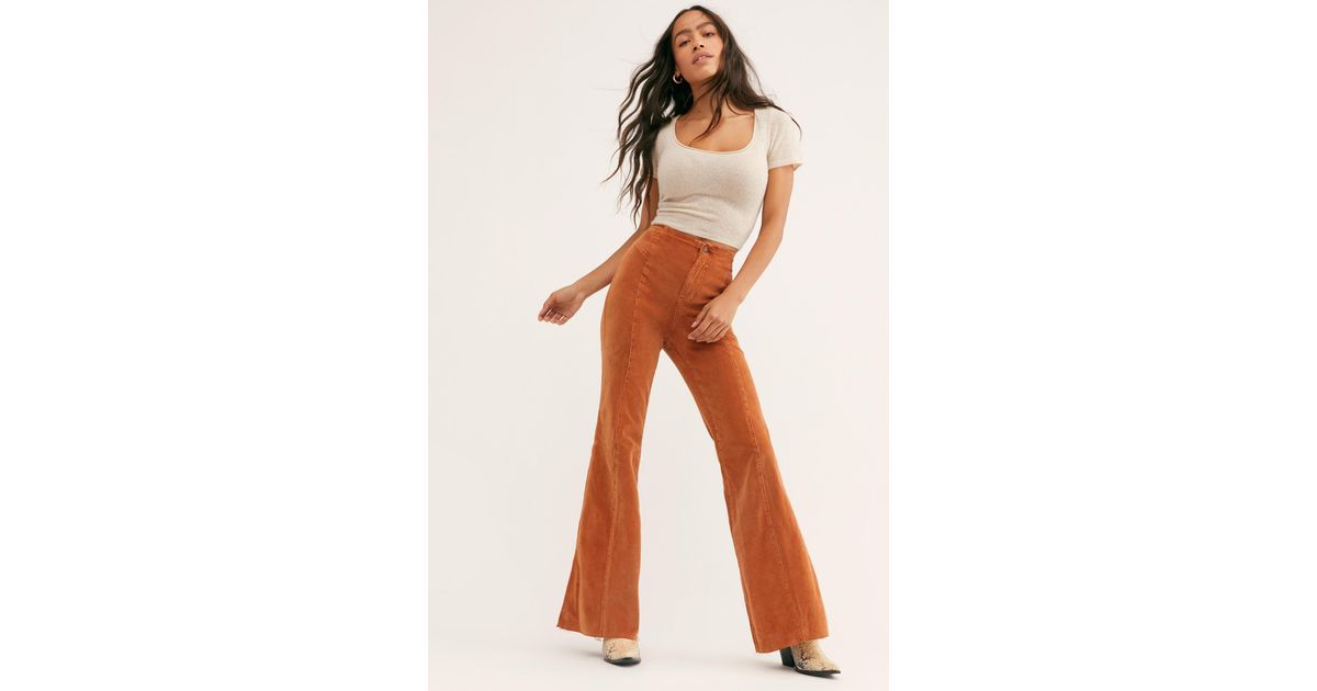 wild honey pinstripe flared dungaree jumpsuit