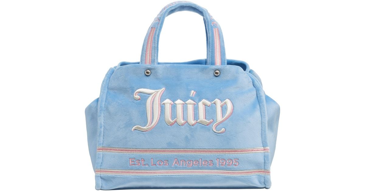【JUICY COUTURE】アイリスパッチ トートバッグ juicy-couture-gnawed-blue-