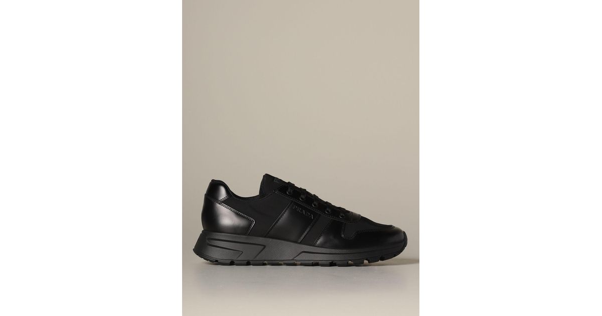 prada triple black runners