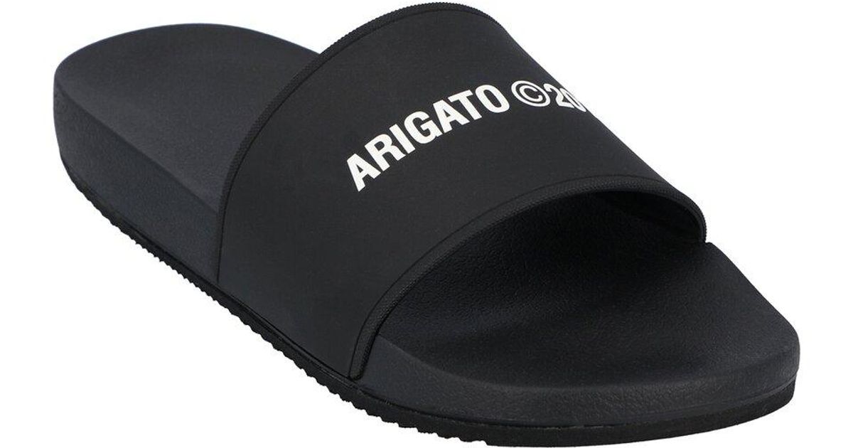 Axel Arigato Rubber Pool Slide in Black Save 1 Lyst Canada