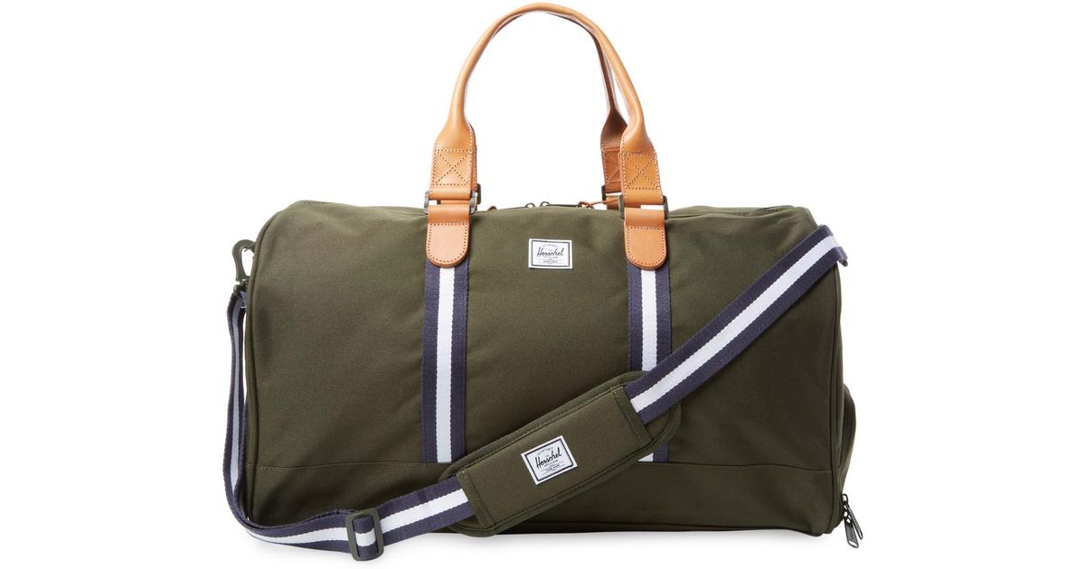 forest green duffle bag