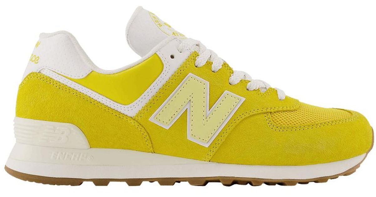 new balance black yellow