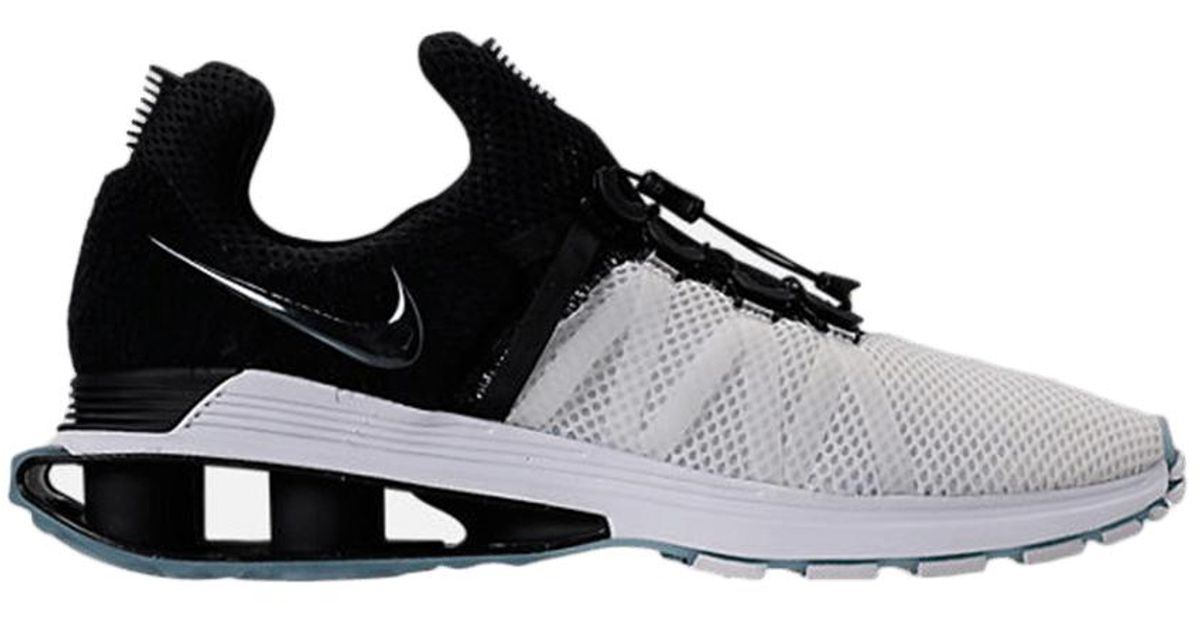 nike shox gravity black and white