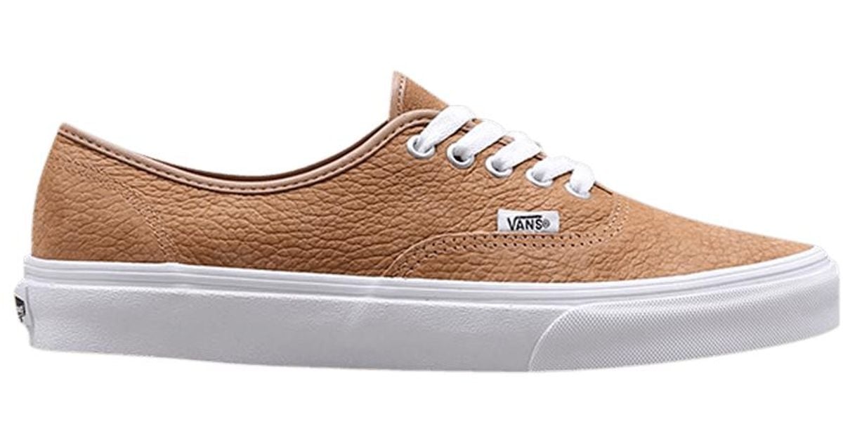 brown and tan vans