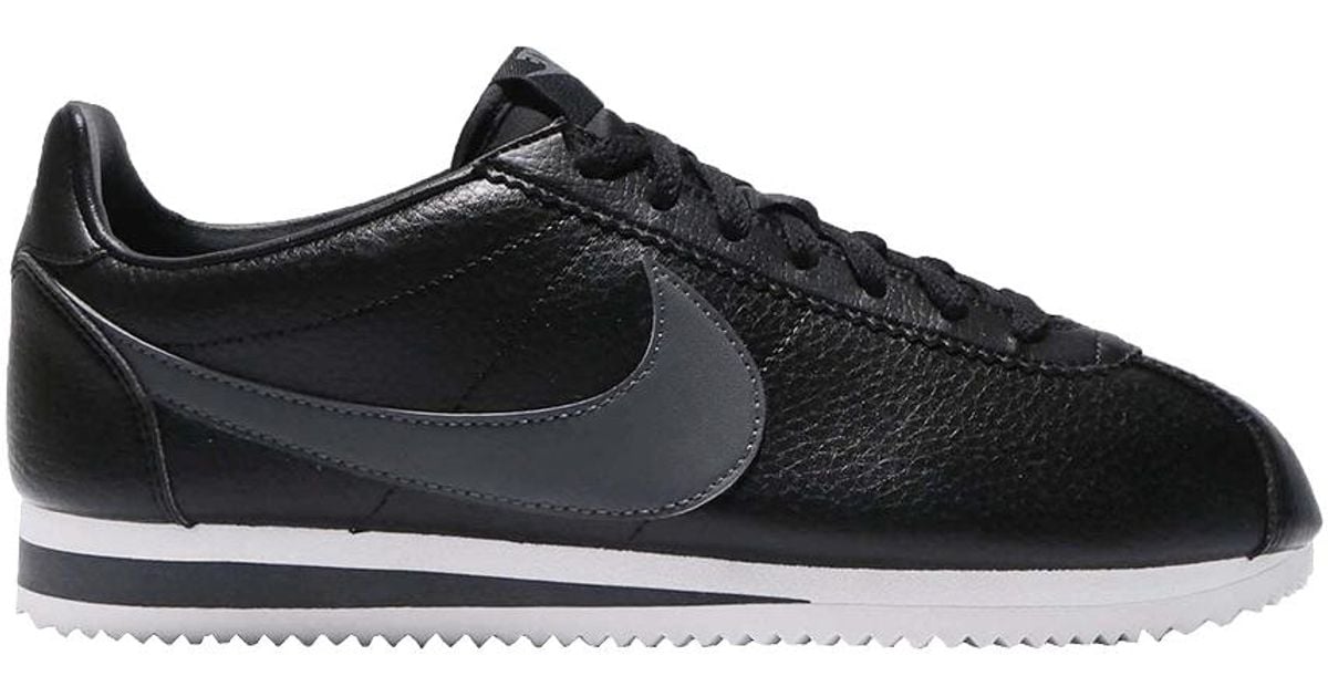 nike cortez black junior