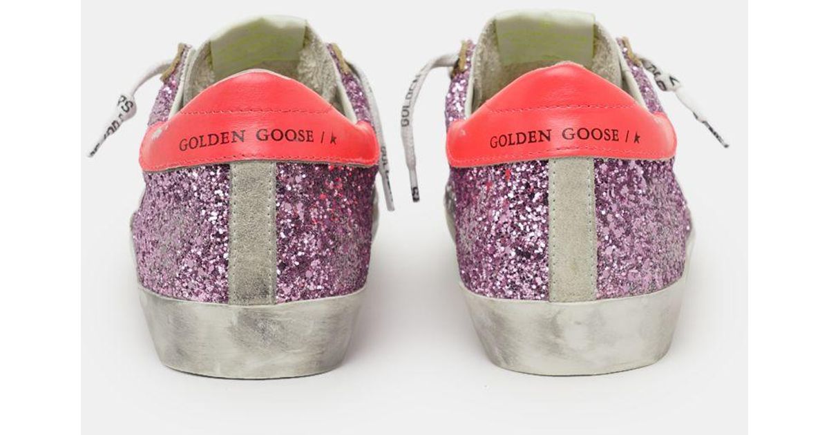 slide sneakers with leopard print pony skin inserts