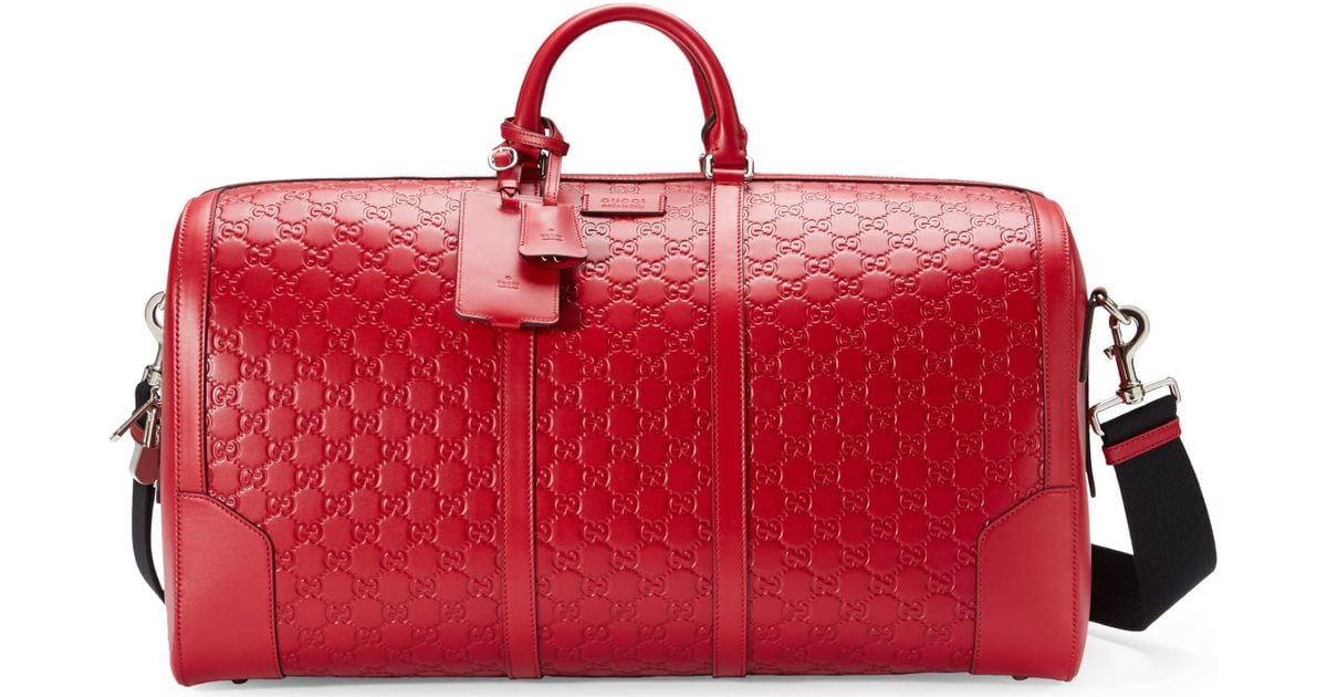 Gucci Signature Leather Duffle in Red for Men