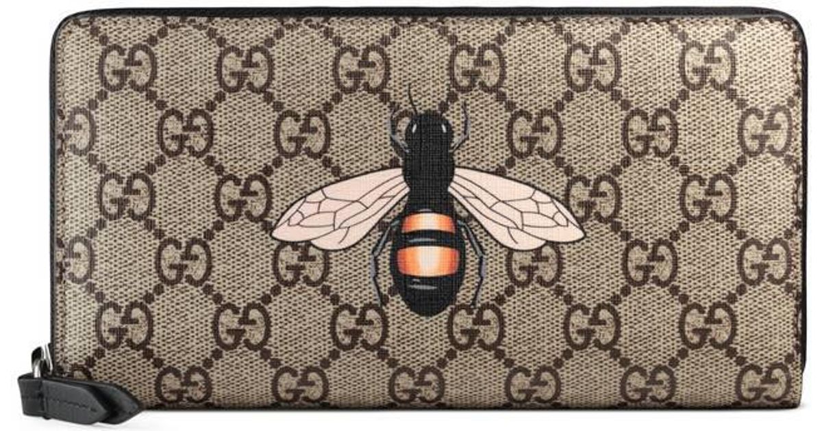 Portefeuille zippé Suprême GG à imprimé abeille Gucci pour homme | Lyst