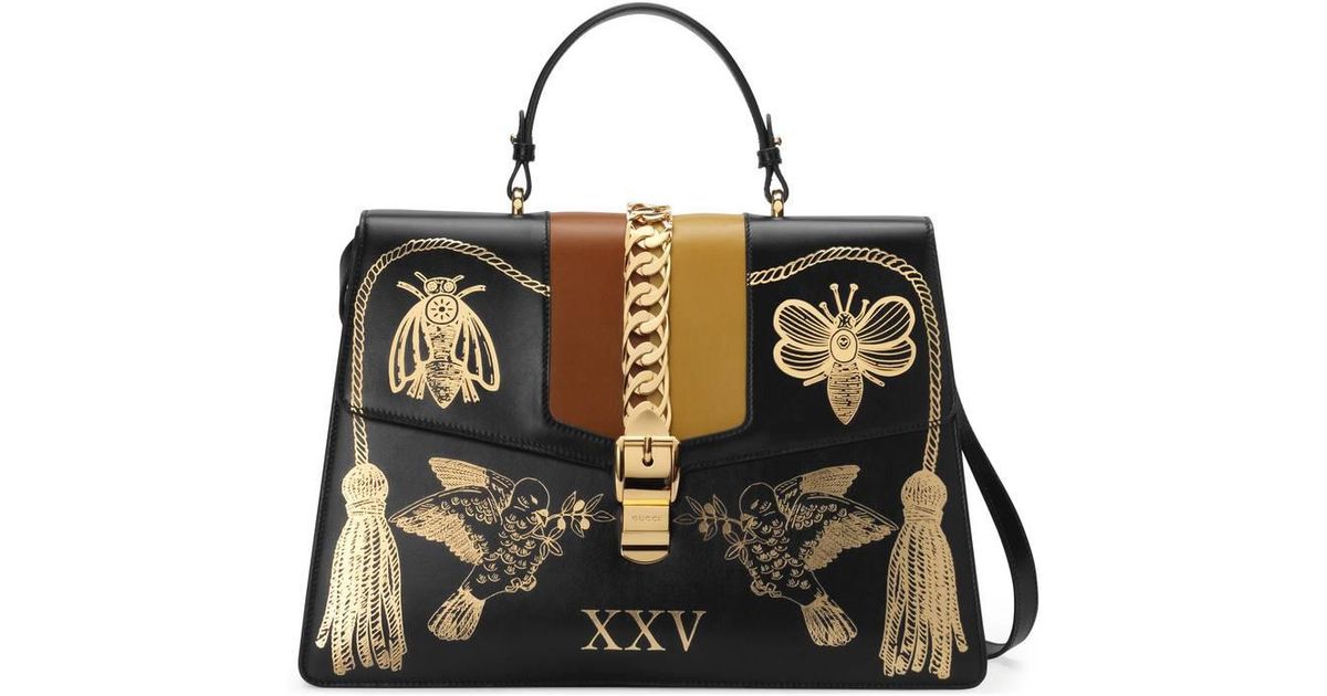 sylvie leather maxi top handle bag