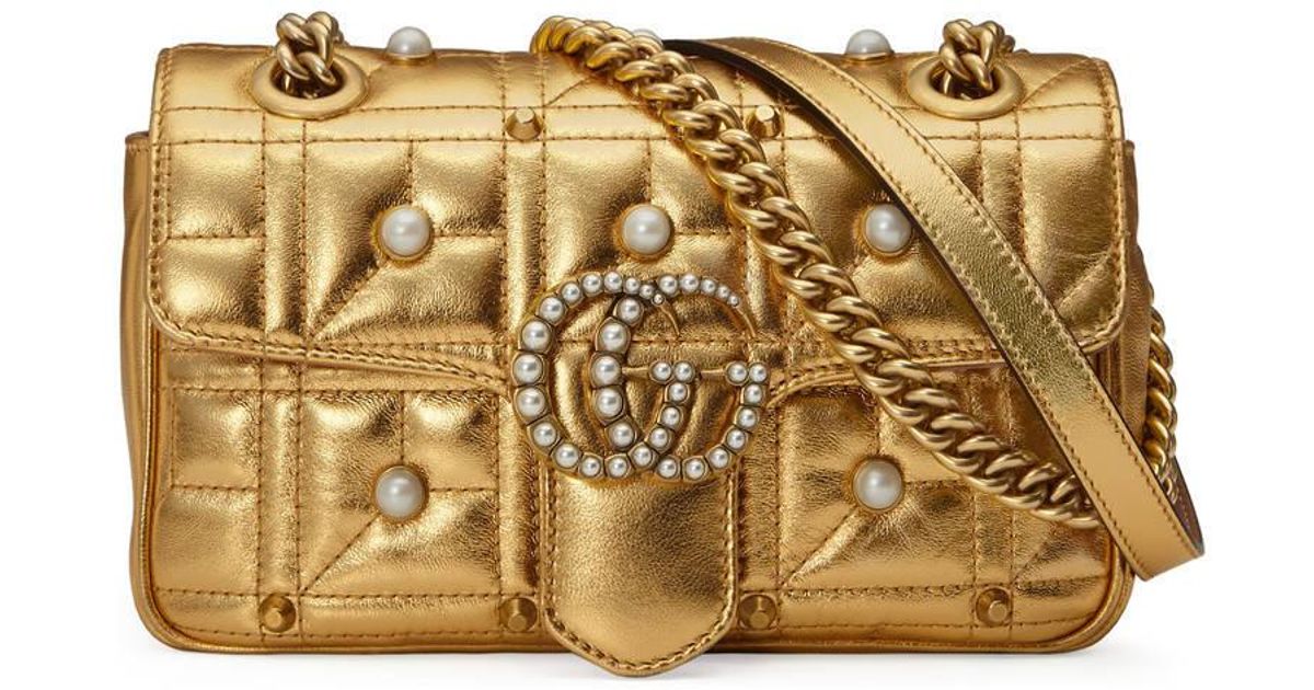 gold gucci handbag