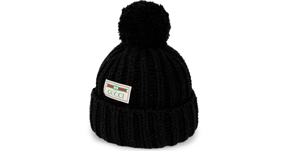gucci hat with pom pom