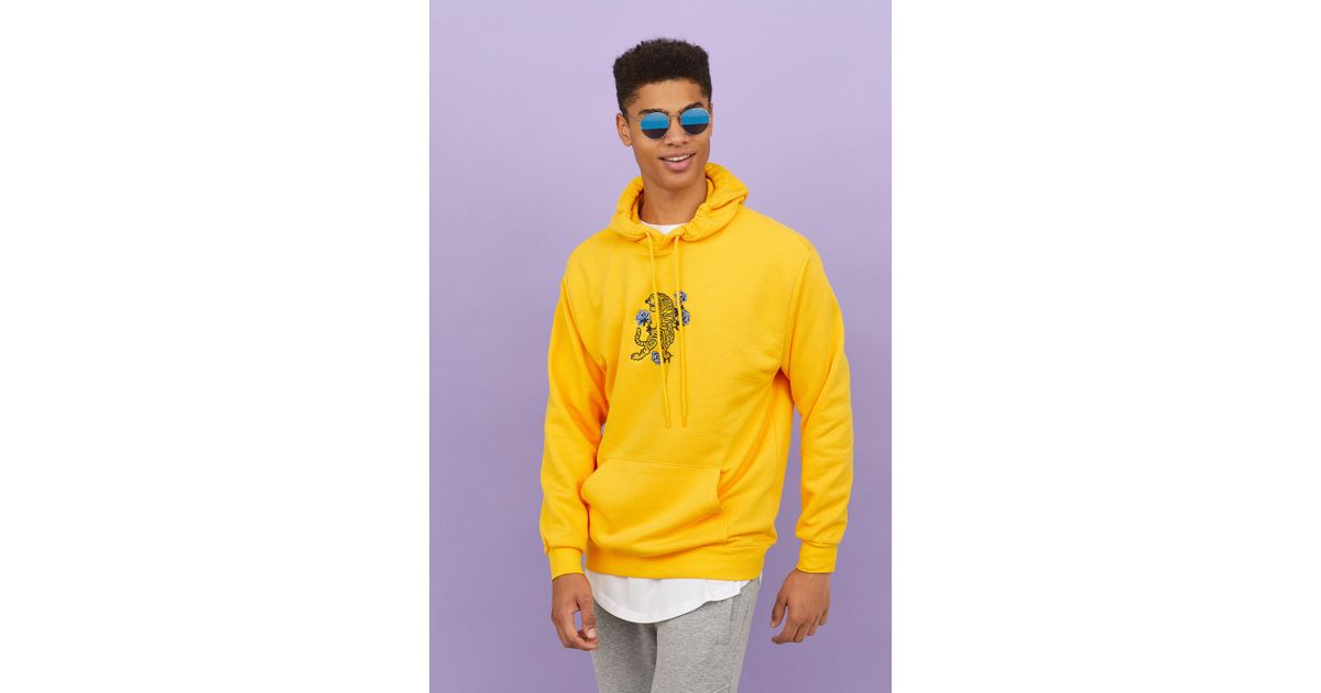 h&m yellow tiger hoodie