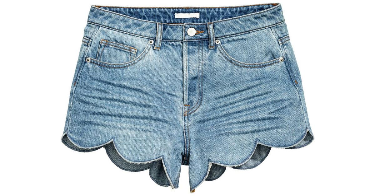 scalloped jean shorts