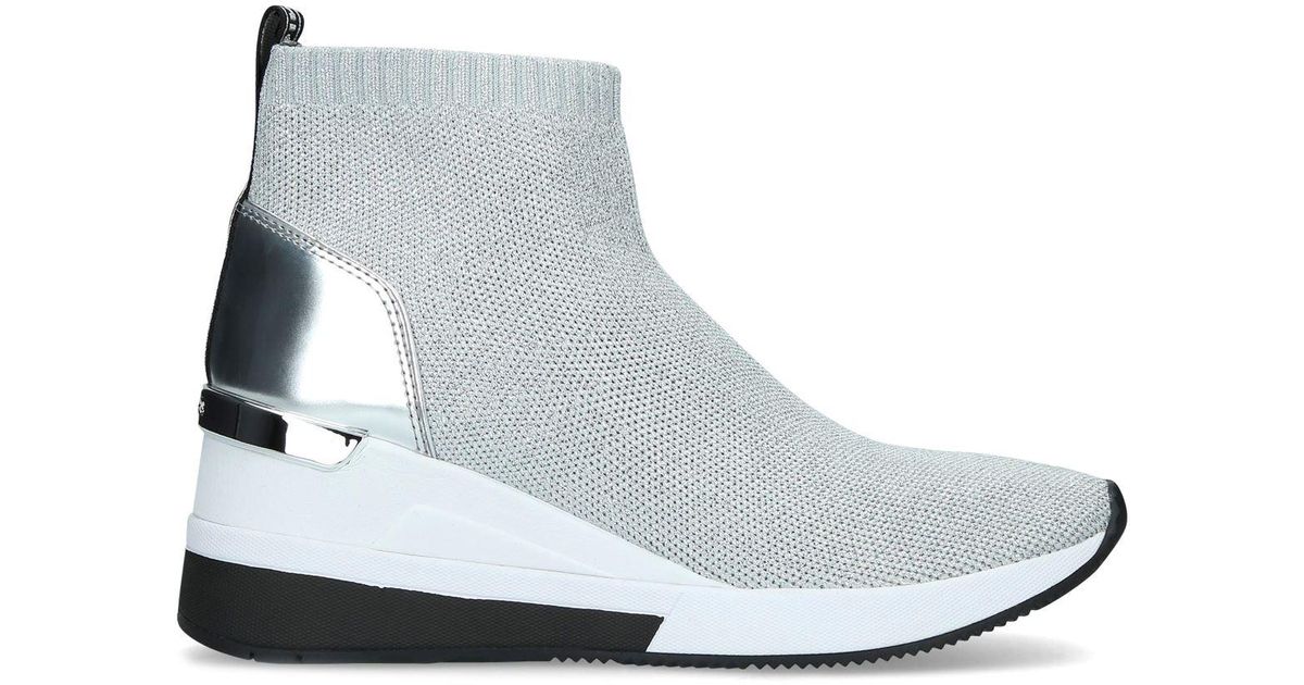 MICHAEL Michael Kors Skyler Wedge Sock Sneakers in Metallic | Lyst