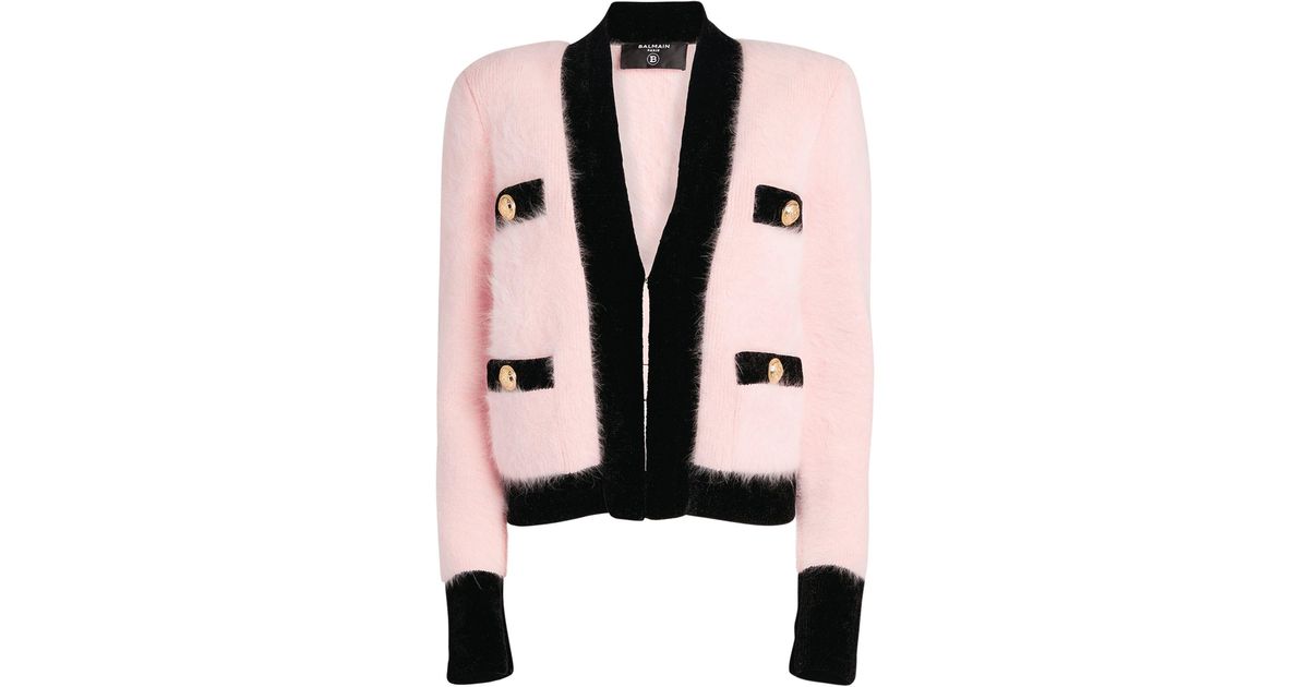 pink cardigan with black trim