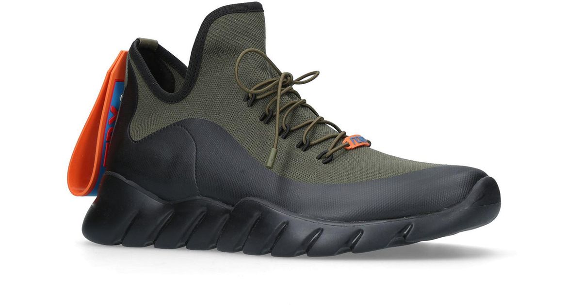 sneakers with green tag