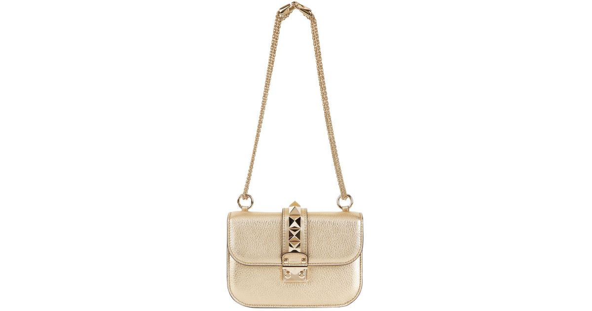 valentino rockstud bag gold