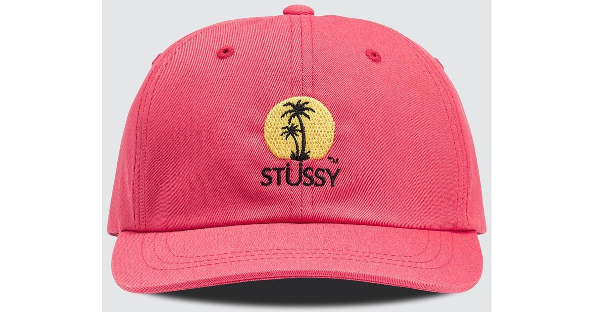 red stussy hat