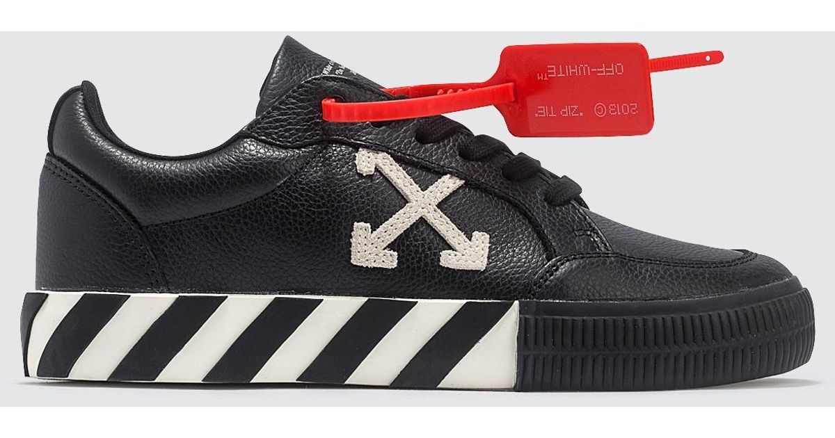 vulc canvas trainers off white