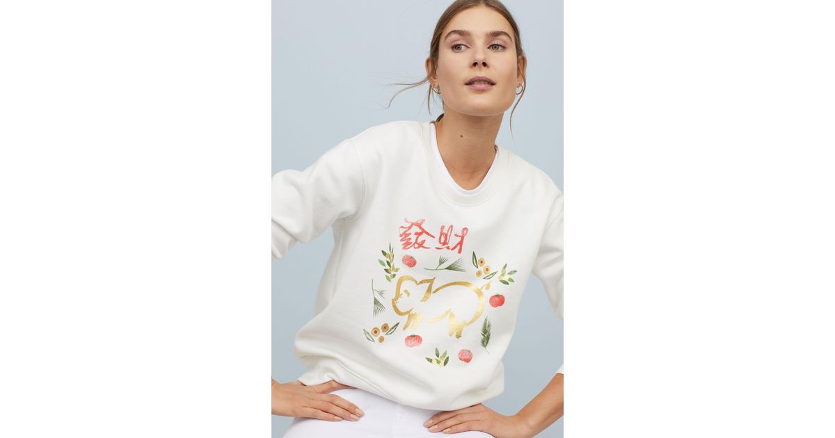 h&m sweatshirt with printed design